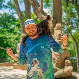 Roatan Exclusive guide with a monkey at Mayan Eden Eco Park