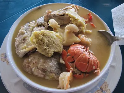 Machuca, a Garifuna seafood soup with lobster, Roatan