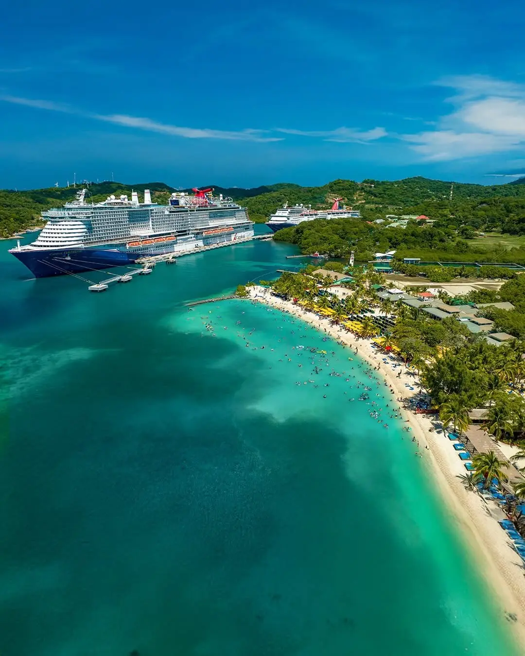 Aerial view of the beach and cruise ship at Isla Tropicale, Roatan